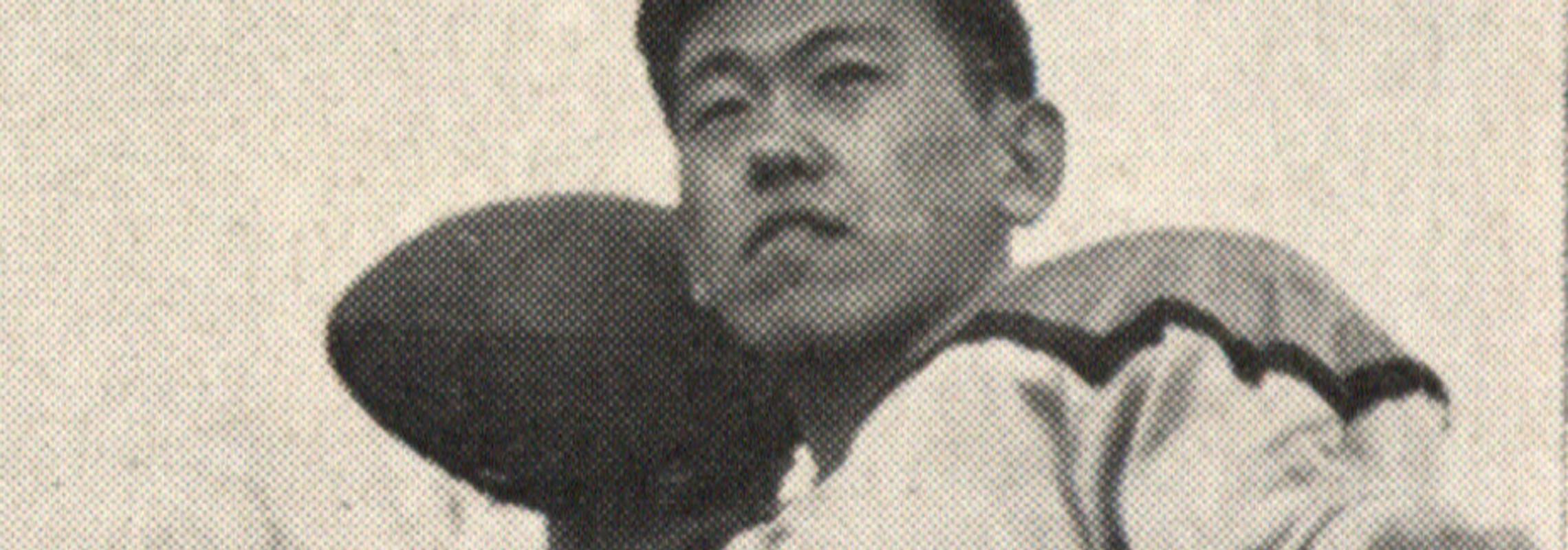 Jack Nomi with a football, 1946
