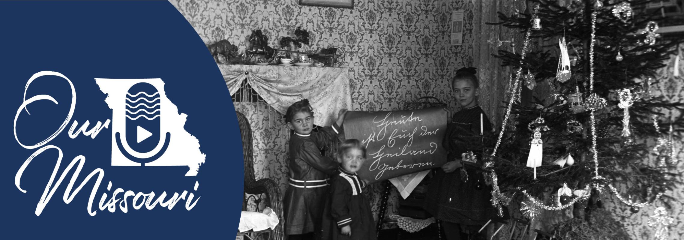 Kemper girls holding Christmas banner translated as "Today the Savior is born to you." [Edward J. Kemper Collection (C4388)]