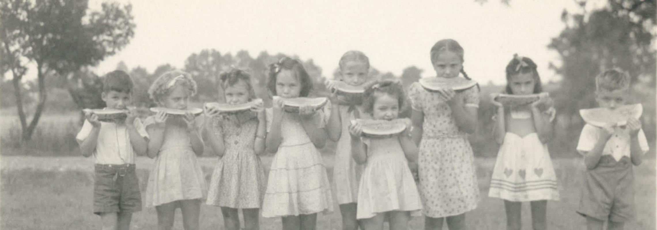 Photograph of Children Eating Watermelon in 1942