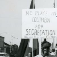 Civil Rights/segregation protest image with added words "African American Experience in Missouri"