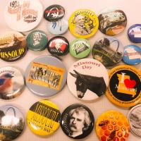 Photo of a variety of past NHDMO buttons