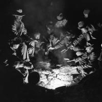 Missouri sharecroppers gather around a fire, 1939